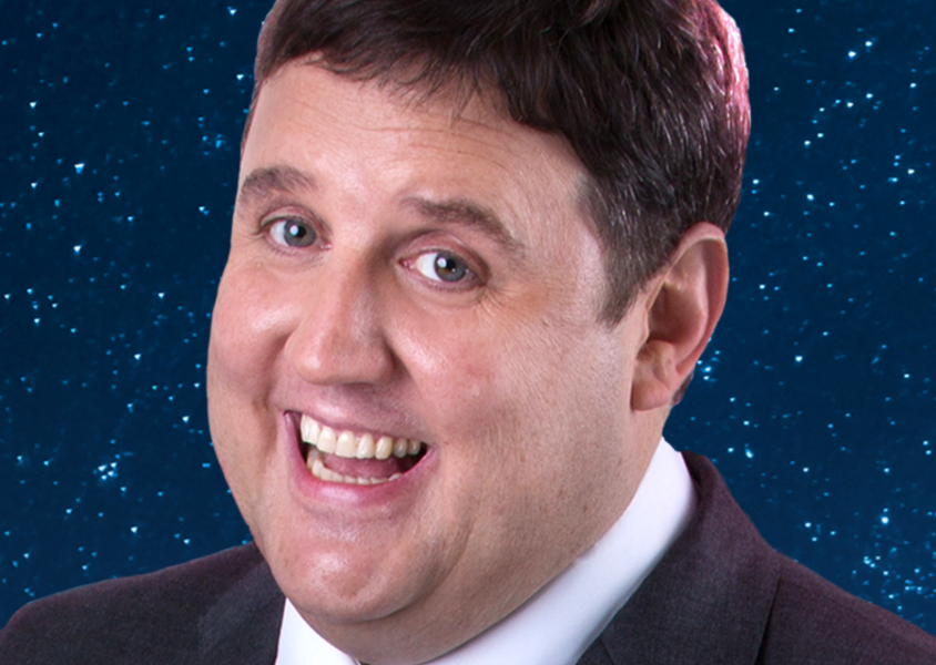 Peter Kay in front of night skyx